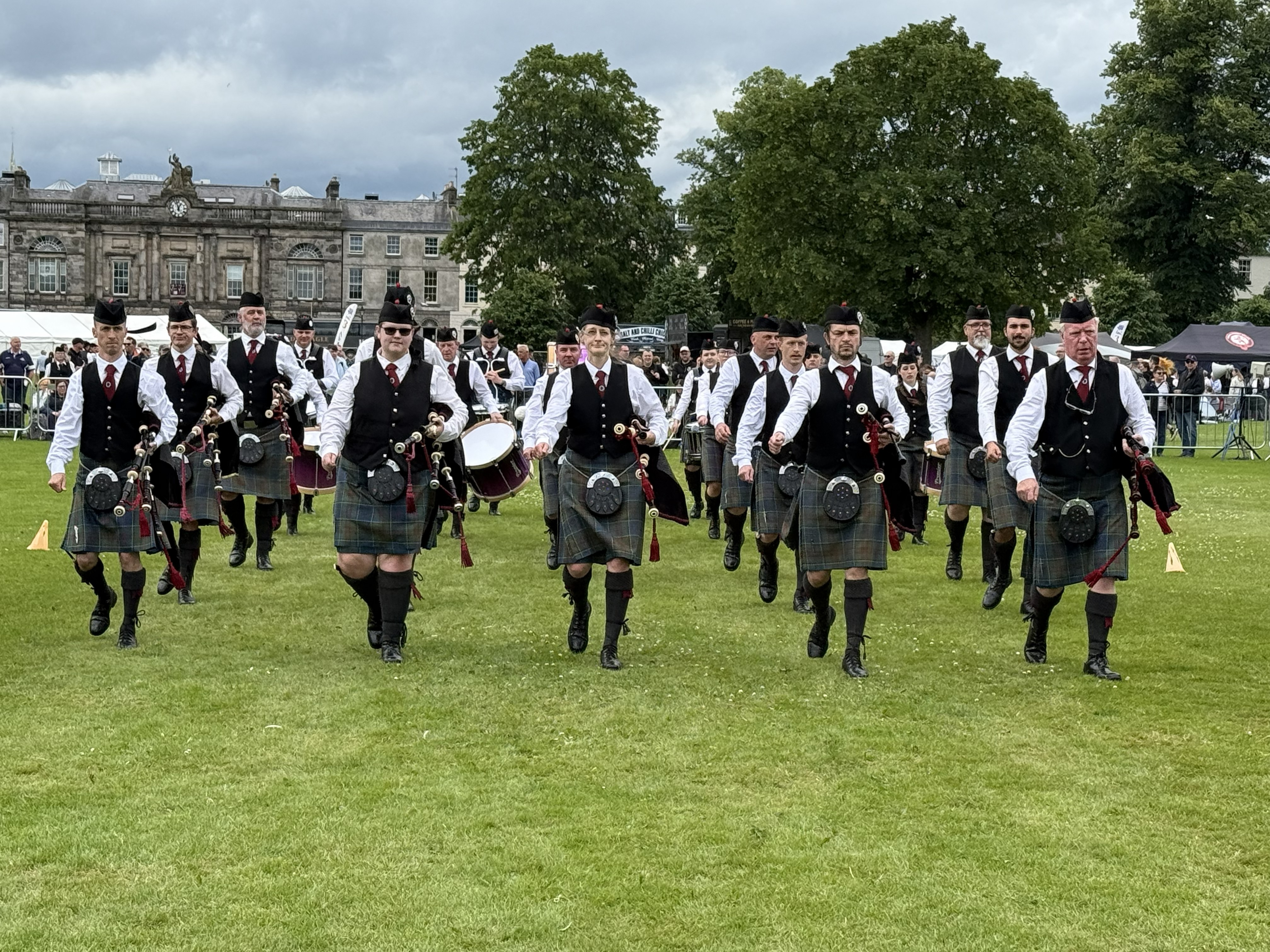 Stockbridge Pipe Band Grade 3B marching off the arena at the European Pipe Band Championships 2026